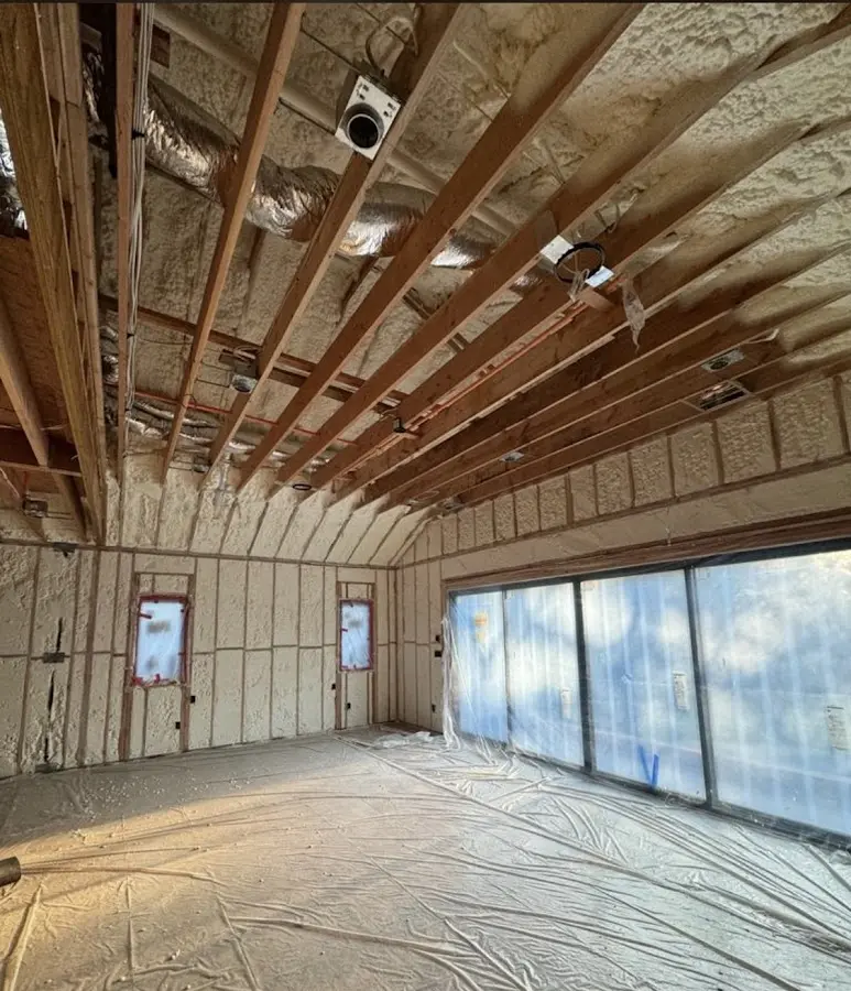 Interior walls and ceiling insulated with spray foam during new construction in Barnegat